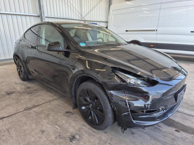 2024 Tesla Model Y Basis RWD — 1