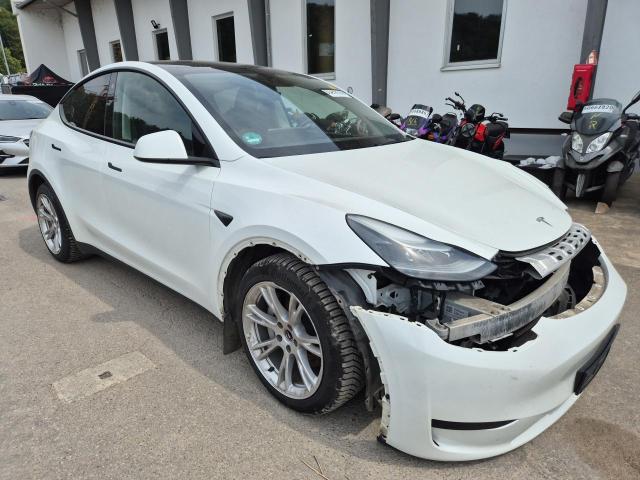 2024 Tesla Model Y (01.2021->) Basis RWD — 1